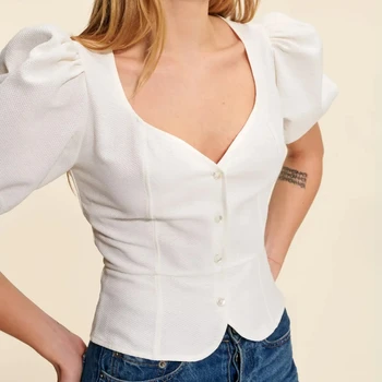 2023 האביב והקיץ הלבן החדש V-צוואר טהור רצון סגנון פאף שרוול חולצת נשים